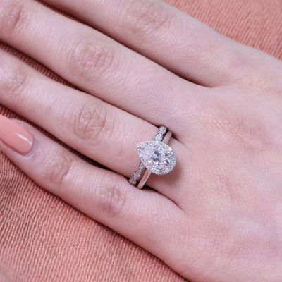 Pear Cut Moissanite Ring With Scalloped Diamond Band