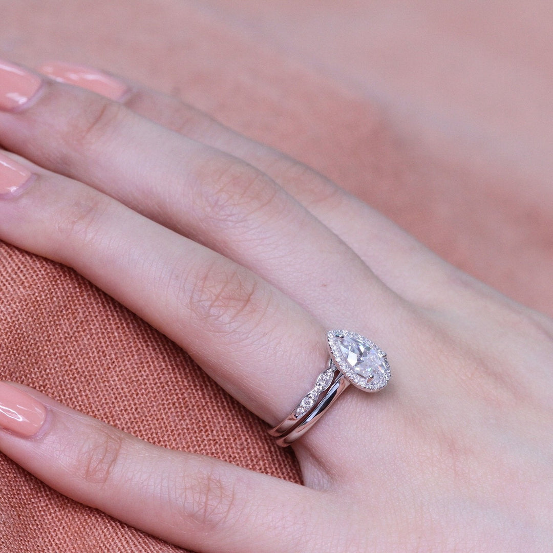 Pear Cut Moissanite Ring With Scalloped Diamond Band