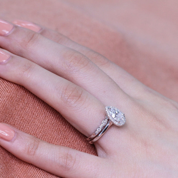 Pear Cut Moissanite Ring With Scalloped Diamond Band