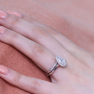 Pear Cut Moissanite Ring With Scalloped Diamond Band