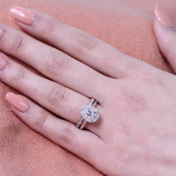 Pear Cut Moissanite Ring With Scalloped Diamond Band