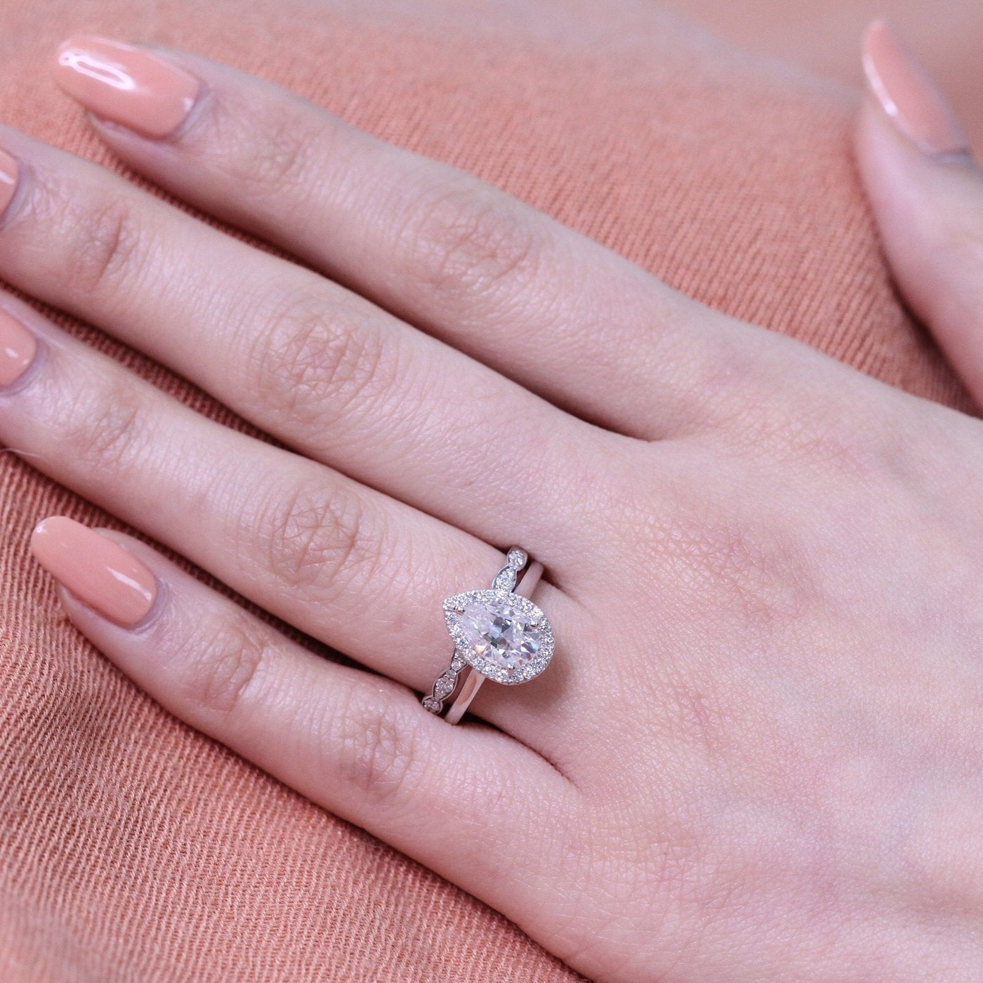 Pear Cut Moissanite Ring With Scalloped Diamond Band