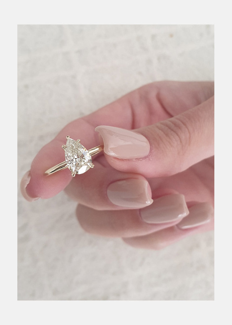 1.31ct Pear Cut Solitaire Moissanite Diamond Engagement Ring