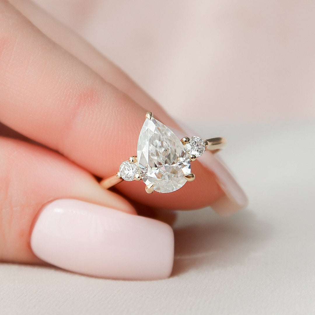 2.0 CT Pear Cut Three Stone Moisanite Engagement Ring